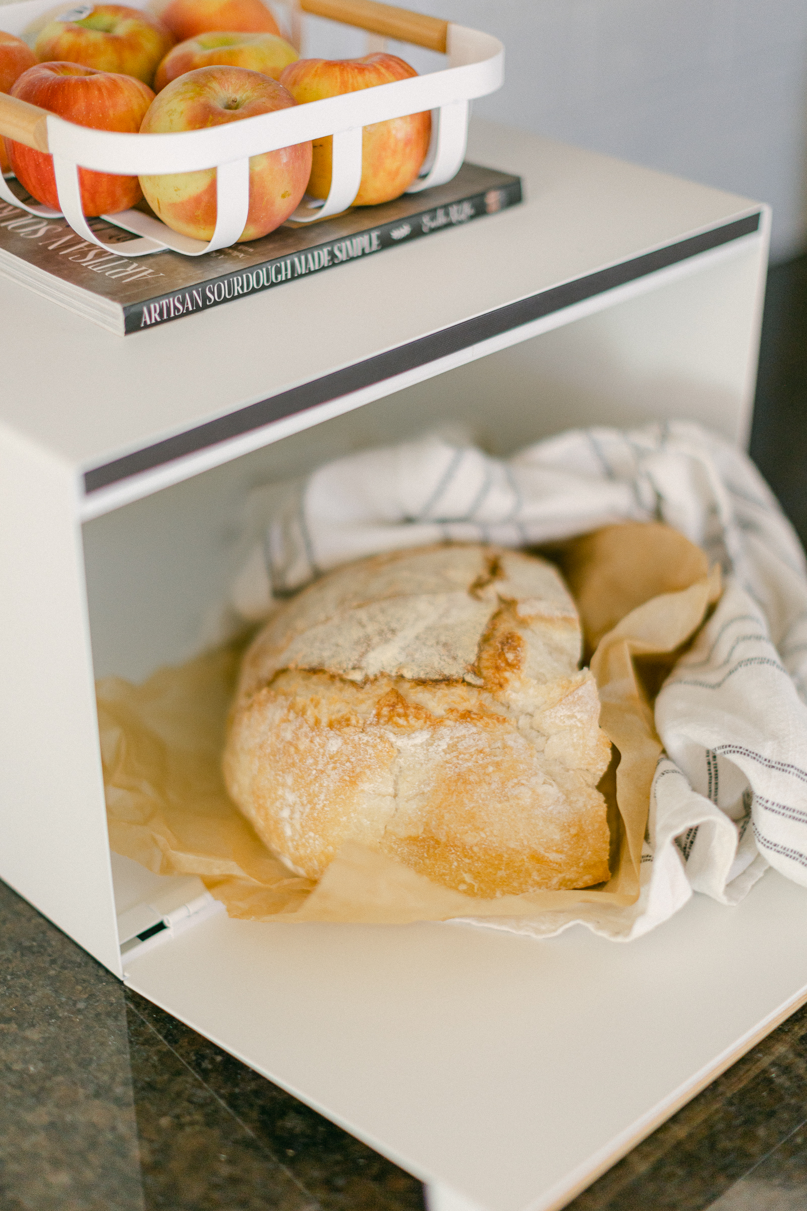 image of sourdough bread in sleek white bread box